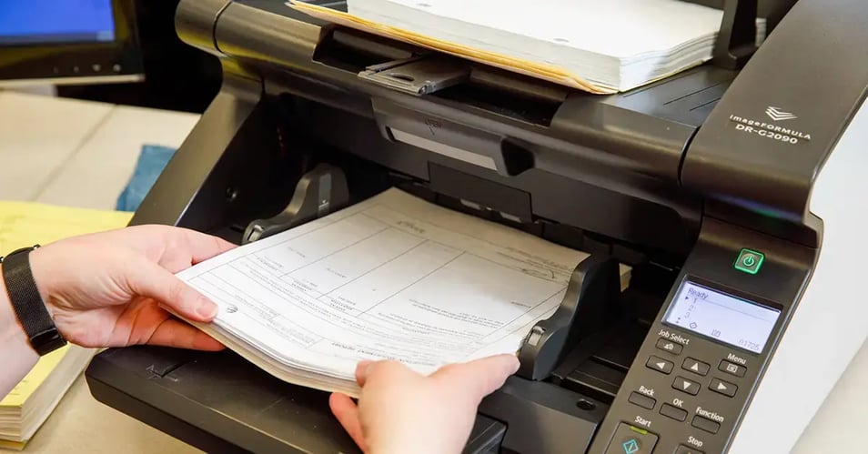 an image of bulk document scanning of invoices by eo johnson