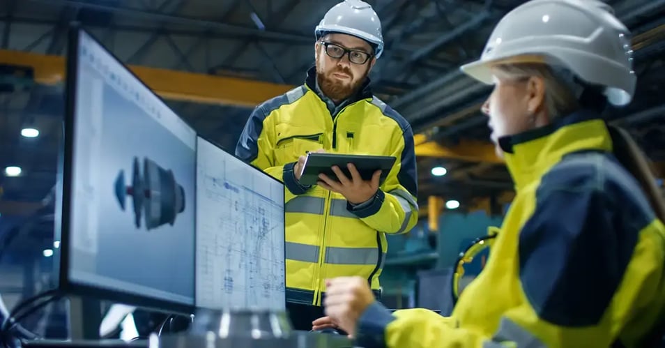 image of two warehouse employees securely accessing production documents