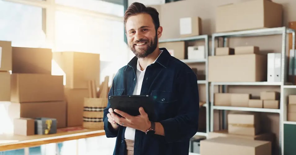 an image of an entrepreneur reviewing secure data from his tablet