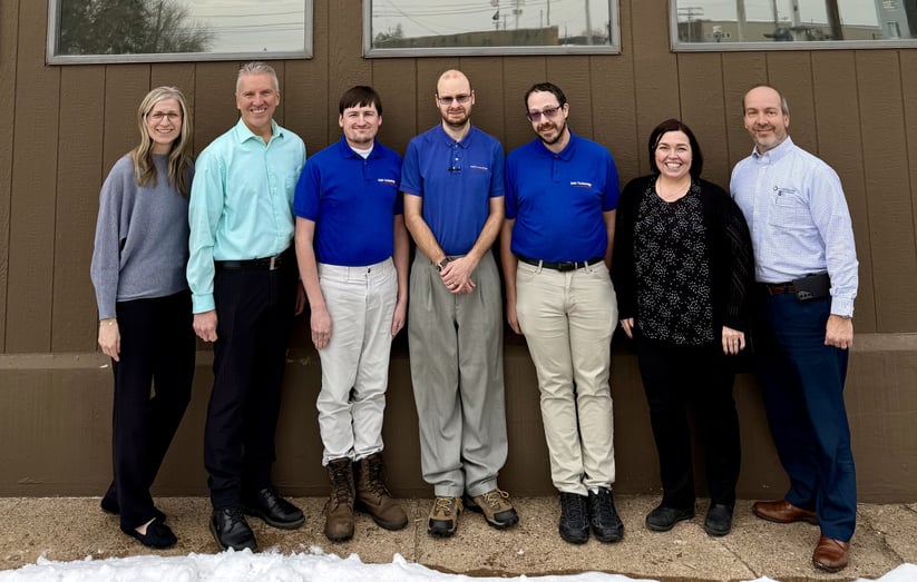 group photo taken the day EO Johnson acquired Orbit