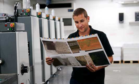 Employee in production print and finishing