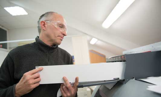 technician loading toner