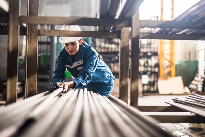 Worker Pulling Rebar